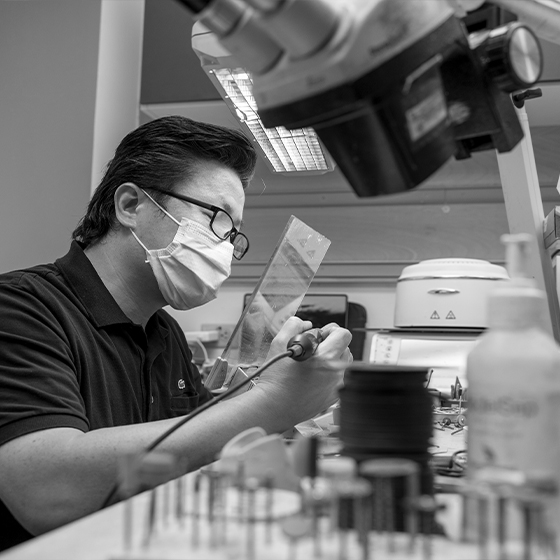 Ceramist working in a dental laboratory