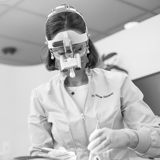 Dentist giving a patient a dental exam