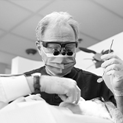 Dentist examining a patients mouth