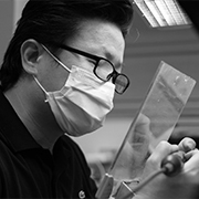 Ceramist creating a dental crown