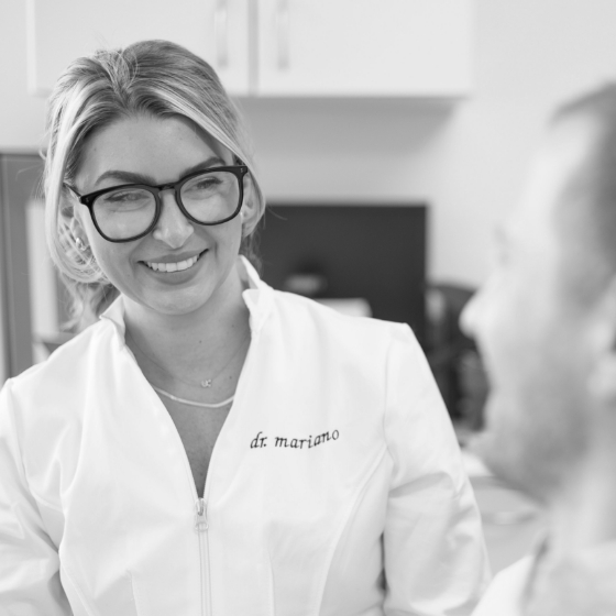 Boston dentist smiling at a patient