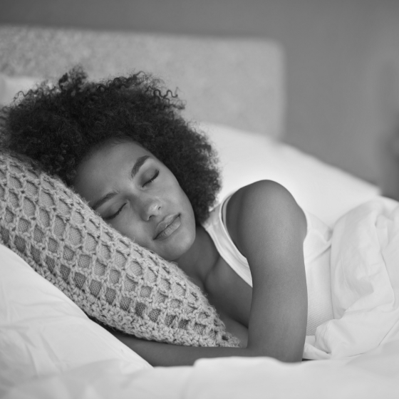 Woman sleeping soundly on her side