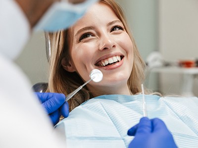 Patient in Boston smiling at their prosthodontist