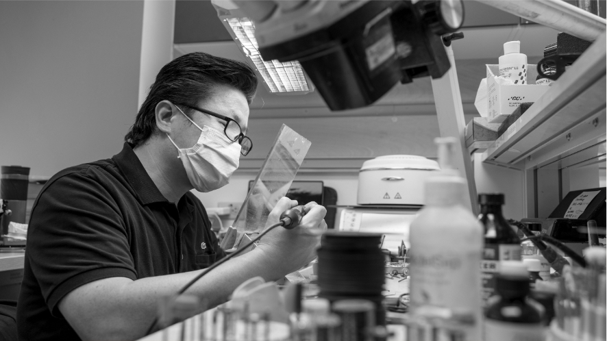 Ceramist working in a dental laboratory