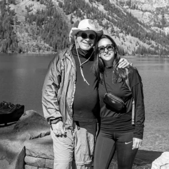 Doctor Malament with his wife outdoors in sunglasses