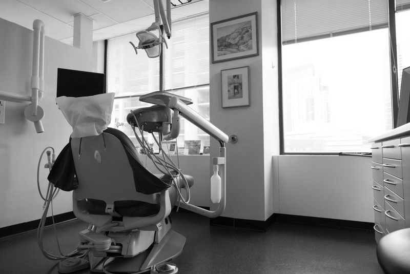 Dental treatment room with large windows