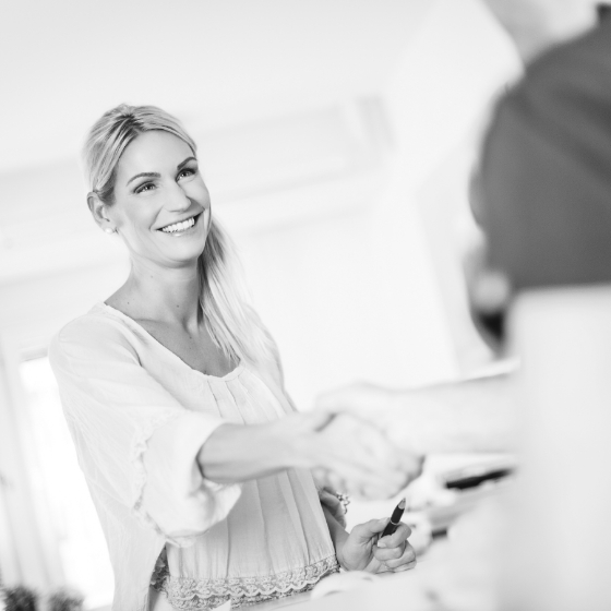 Boston dental patient shaking hands with dentist