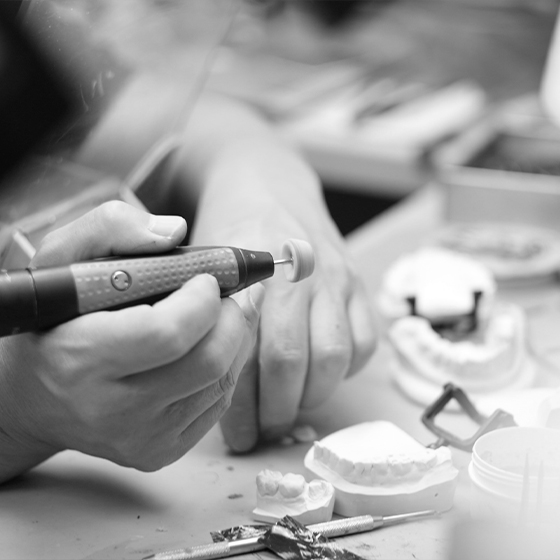 Ceramist creating a dental crown