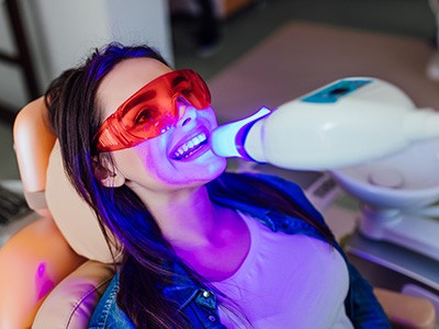 Woman having her teeth whitened