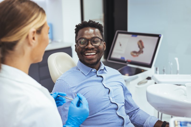 Patient smiling with their new veneers