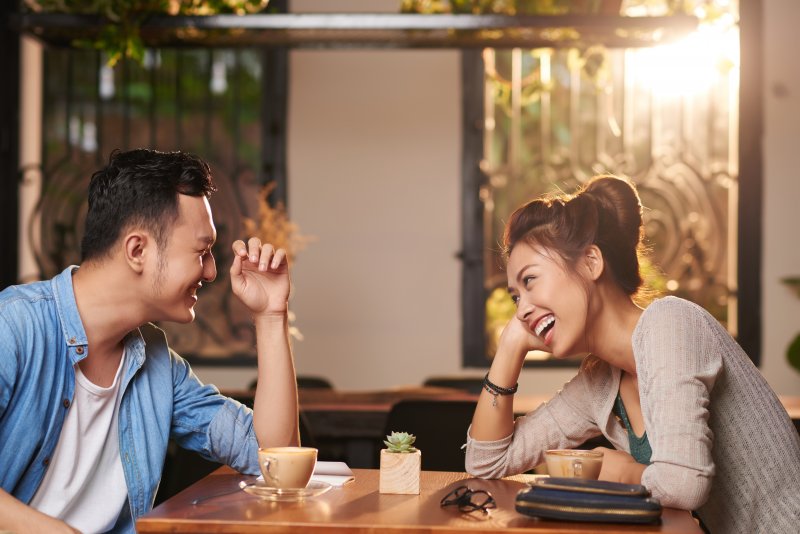 Patient with Invisalign smiling on a date